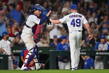 Jun 29, 2026; Chicago, Illinois, USA; Chicago Cubs catcher Miguel Amaya (9) celebrates with pitcher Trent Thornton (49) after ending the top of the ninth inning against the San Diego Padres at Wrigley Field. Mandatory Credit: Patrick Gorski-Imagn Images