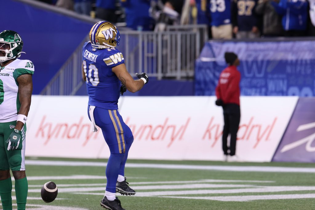 Nov 9, 2024; Winnipeg, Manitoba, CAN; Winnipeg Blue Bombers wide receiver Nic Demski (10) celebrates his touchdown with teammates during the first half of the game between the Winnipeg Blue Bombers and the Saskatchewan Roughriders at Princess Auto Stadium. Mandatory Credit: Bruce Fedyck-Imagn Images