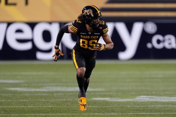 Nov 8, 2025; Hamilton, Ontario, Canada; Hamilton Tiger-Cats wide receiver Kenny Lawler (89) runs a pass pattern against the Montreal Alouettes at Hamilton Stadium. Mandatory Credit: John E. Sokolowski-Imagn Images