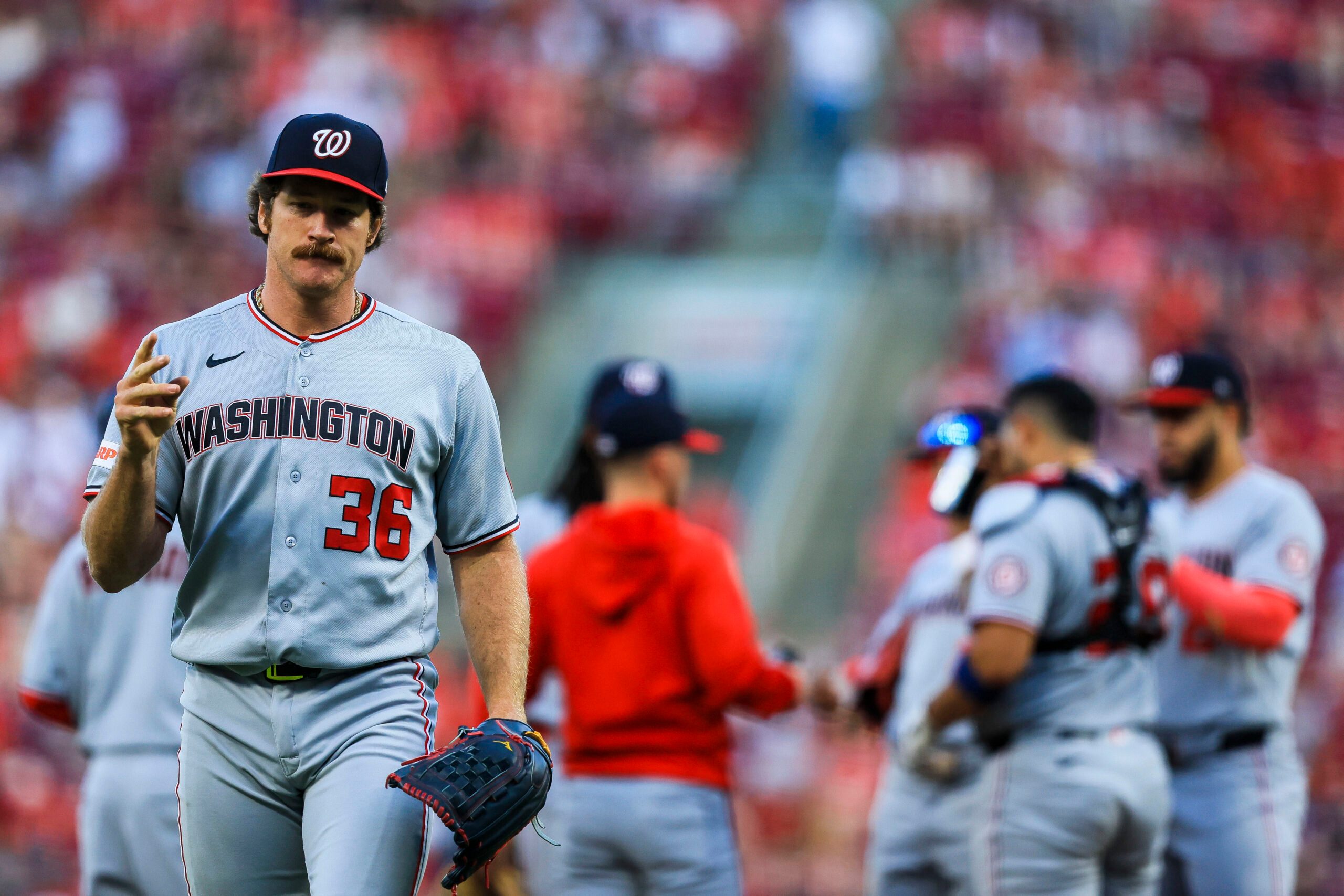 May 12, 2026; Cincinnati, Ohio, USA; Washington Nationals starting pitcher Miles Mikolas (36) walks off the field during a pitching change in the fourth inning against the Cincinnati Reds at Great American Ball Park. Mandatory Credit: Katie Stratman-Imagn Images