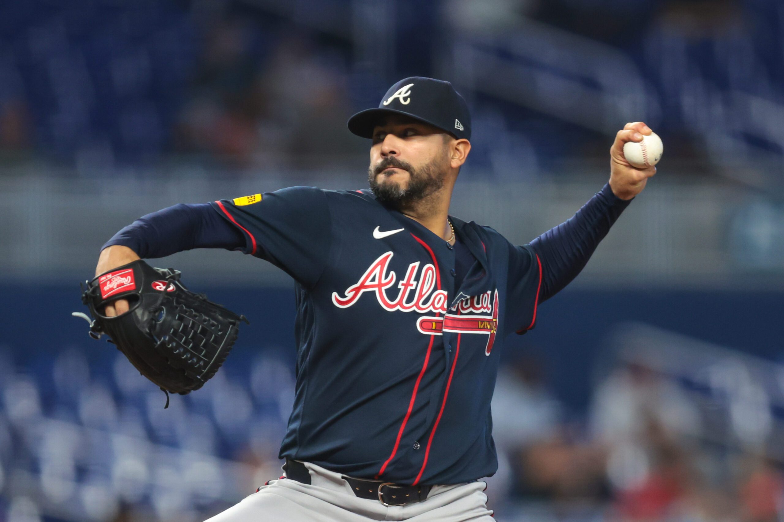 May 19, 2026; Miami, Florida, USA; Atlanta Braves starting pitcher Martin Perez (33) delivers a pitch against the Miami Marlins during the fifth inning at loanDepot Park. Mandatory Credit: Sam Navarro-Imagn Images