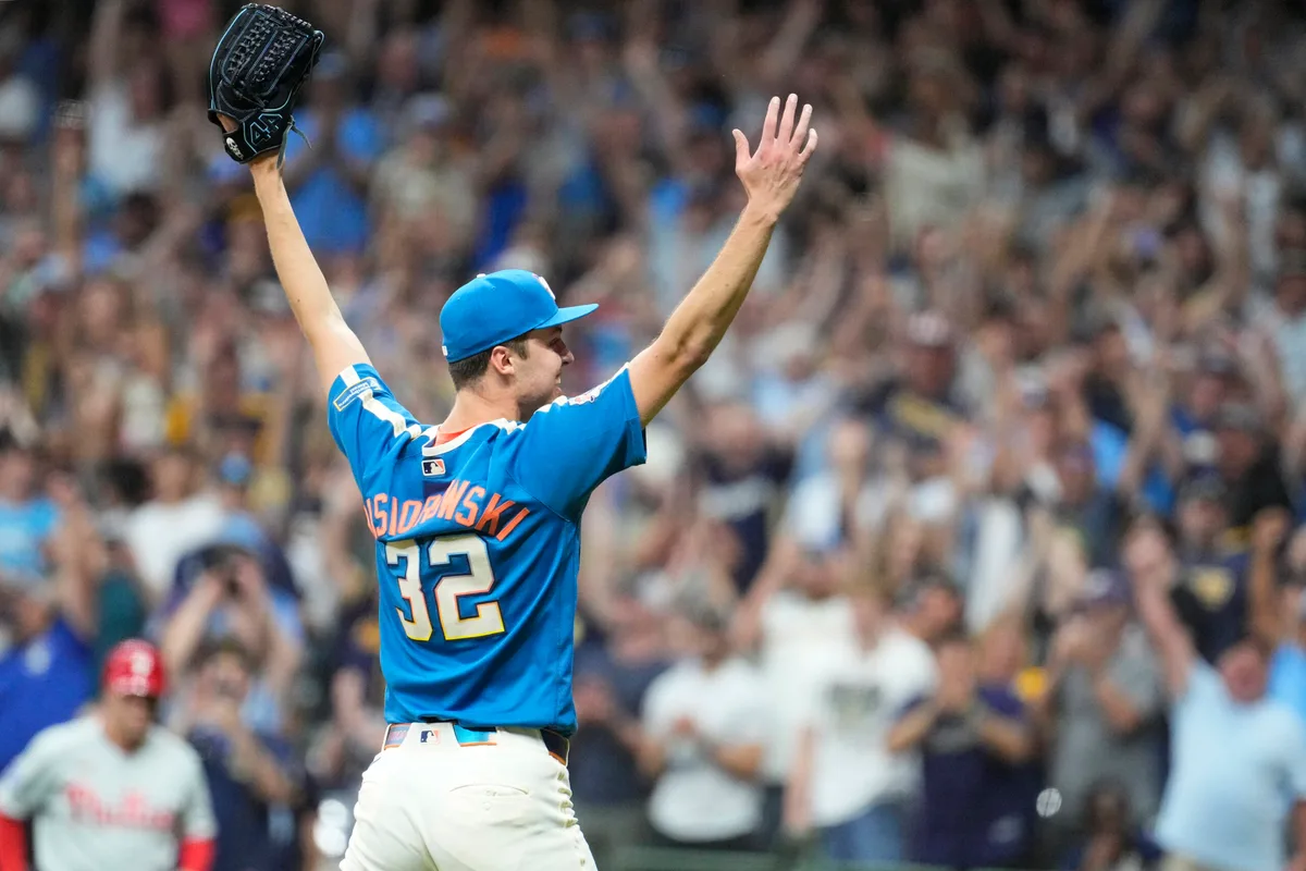 Jun 12, 2026; Milwaukee, Wisconsin, USA; Milwaukee Brewers pitcher Jacob Misiorowski (32) celebrate a nine innings 6-0 win over the Philadelphia Phillies at American Family Field. Misiorowski (32) pitched all nine innings of the game. Mandatory Credit: Michael McLoone-Imagn Images