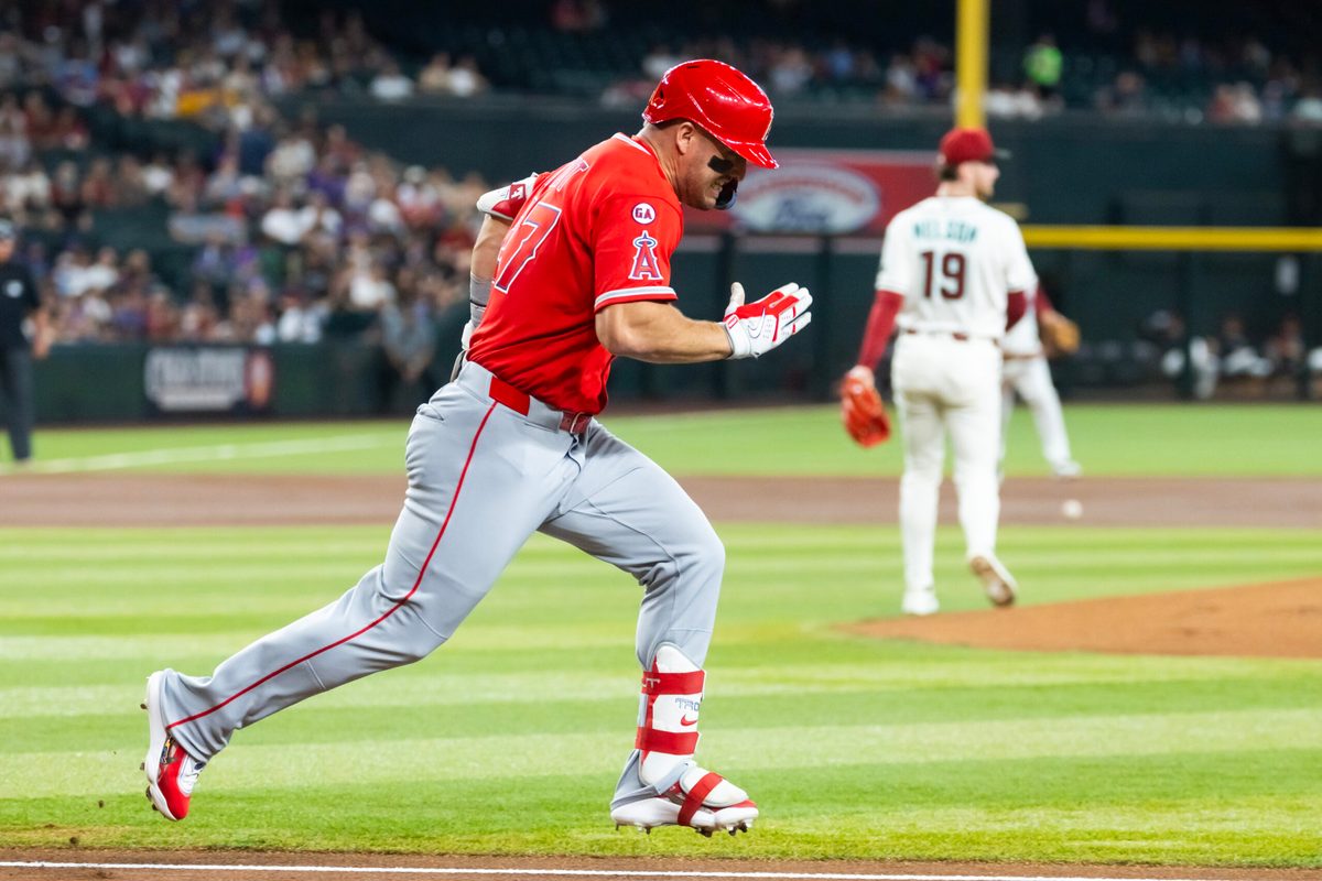 Jun 15, 2026; Phoenix, Arizona, USA; Los Angeles Angels outfielder Mike Trout runs to first base against the Arizona Diamondbacks at Chase Field. Mandatory Credit: Mark J. Rebilas-Imagn Images