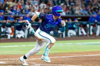 Jun 19, 2026; Phoenix, Arizona, USA; Arizona Diamondbacks outfielder Corbin Carroll hits a three run triple in the eighth inning against the Minnesota Twins at Chase Field. Mandatory Credit: Mark J. Rebilas-Imagn Images
