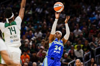 Jun 22, 2026; Seattle, Washington, USA; Dallas Wings guard Arike Ogunbowale (24) shoots against the Seattle Storm during the second quarter at Climate Pledge Arena. Mandatory Credit: Joe Nicholson-Imagn Images