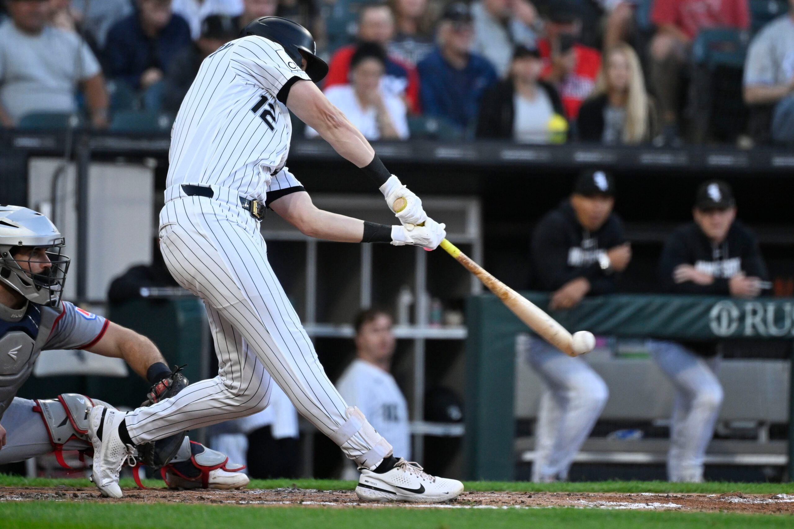 Jun 23, 2026; Chicago, Illinois, USA;  Chicago White Sox shortstop Colson Montgomery (12) hits an RBI single during the fourth inning against the Cleveland Guardians at Rate Field. Mandatory Credit: Matt Marton-Imagn Images