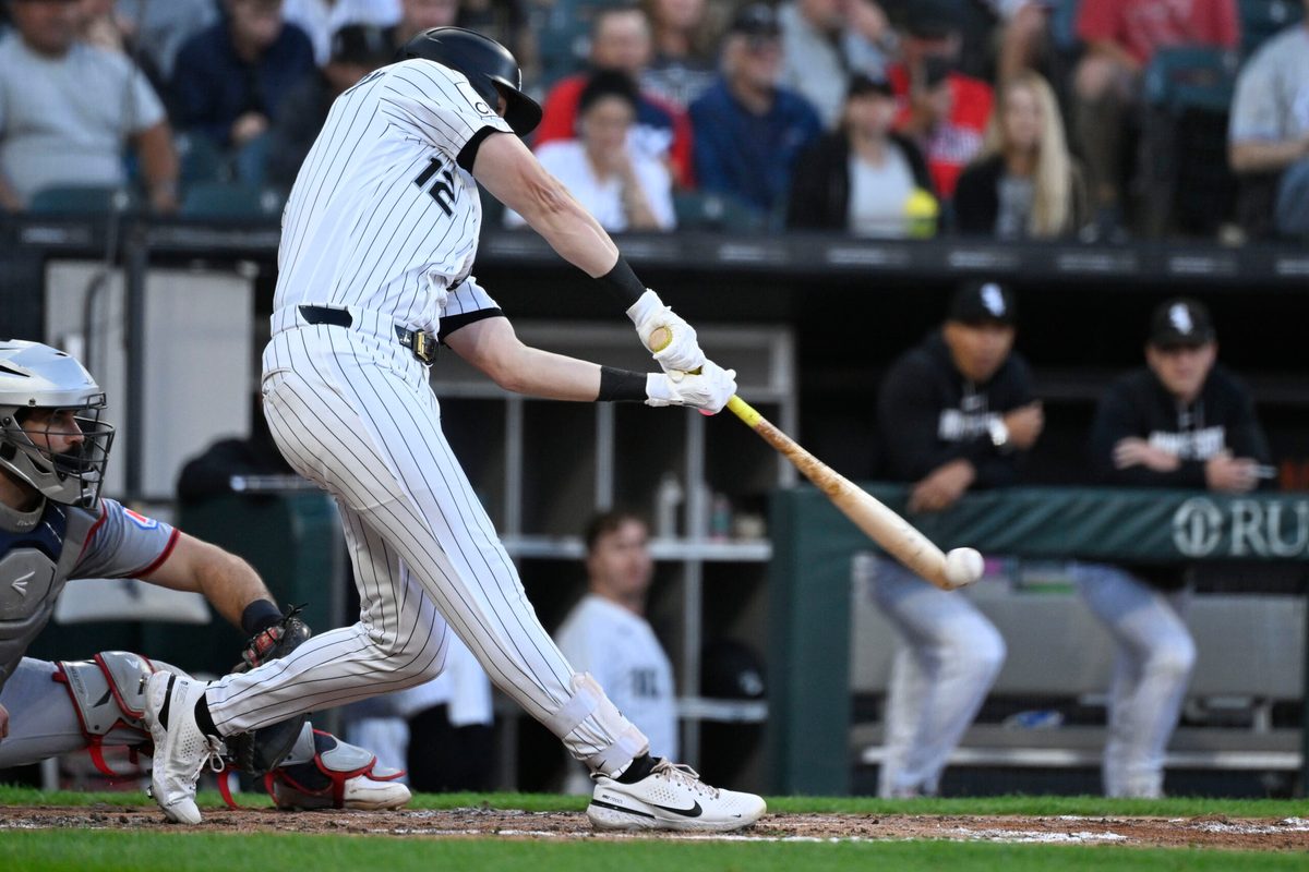 Jun 23, 2026; Chicago, Illinois, USA;  Chicago White Sox shortstop Colson Montgomery (12) hits an RBI single during the fourth inning against the Cleveland Guardians at Rate Field. Mandatory Credit: Matt Marton-Imagn Images