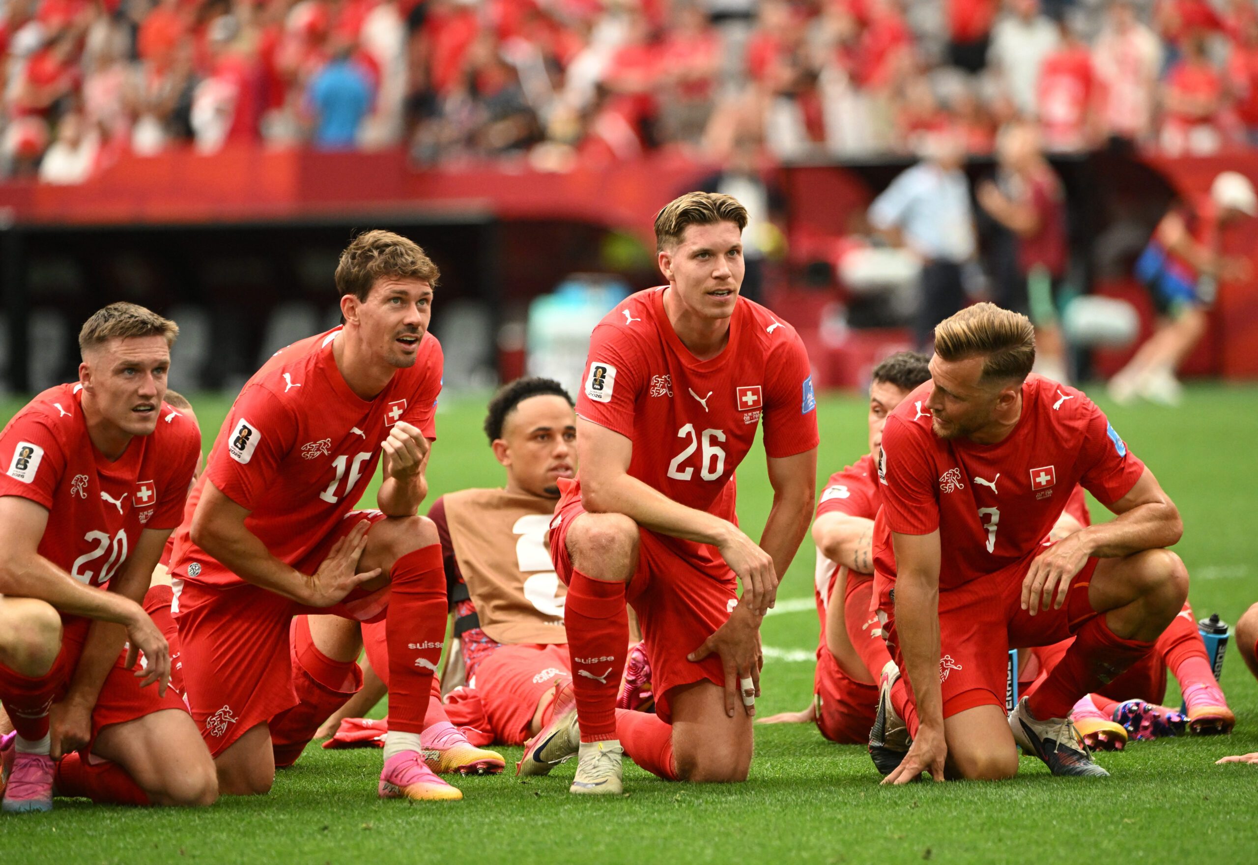 June 24, 2026; Vancouver, Canada; Switzerland's Michel Aebischer, Christian Fassnacht, Cedric Itten and Silvan Widmer celebrate after the match.  Mandatory Credit: Simon Fearn-Imagn Images