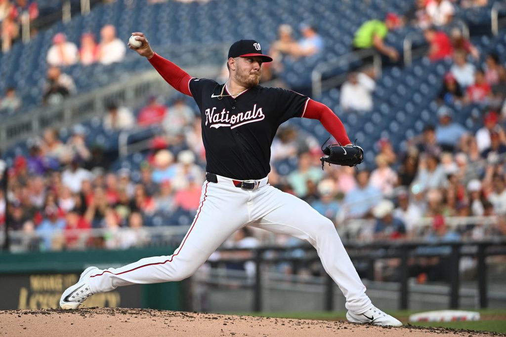 Jun 25, 2026; Washington, District of Columbia, USA; Washington Nationals pitcher Cade Cavalli (24) throws to the Philadelphia Phillies during the second inning at Nationals Park. Mandatory Credit: Brad Mills-Imagn Images