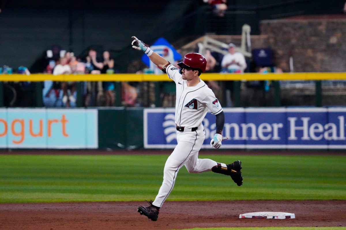 Diamondbacks outfielder Corbin Carroll (7) rounds second after hitting a grand-slam against the Angels during a game at Chase Field in Phoenix on June 17, 2026.