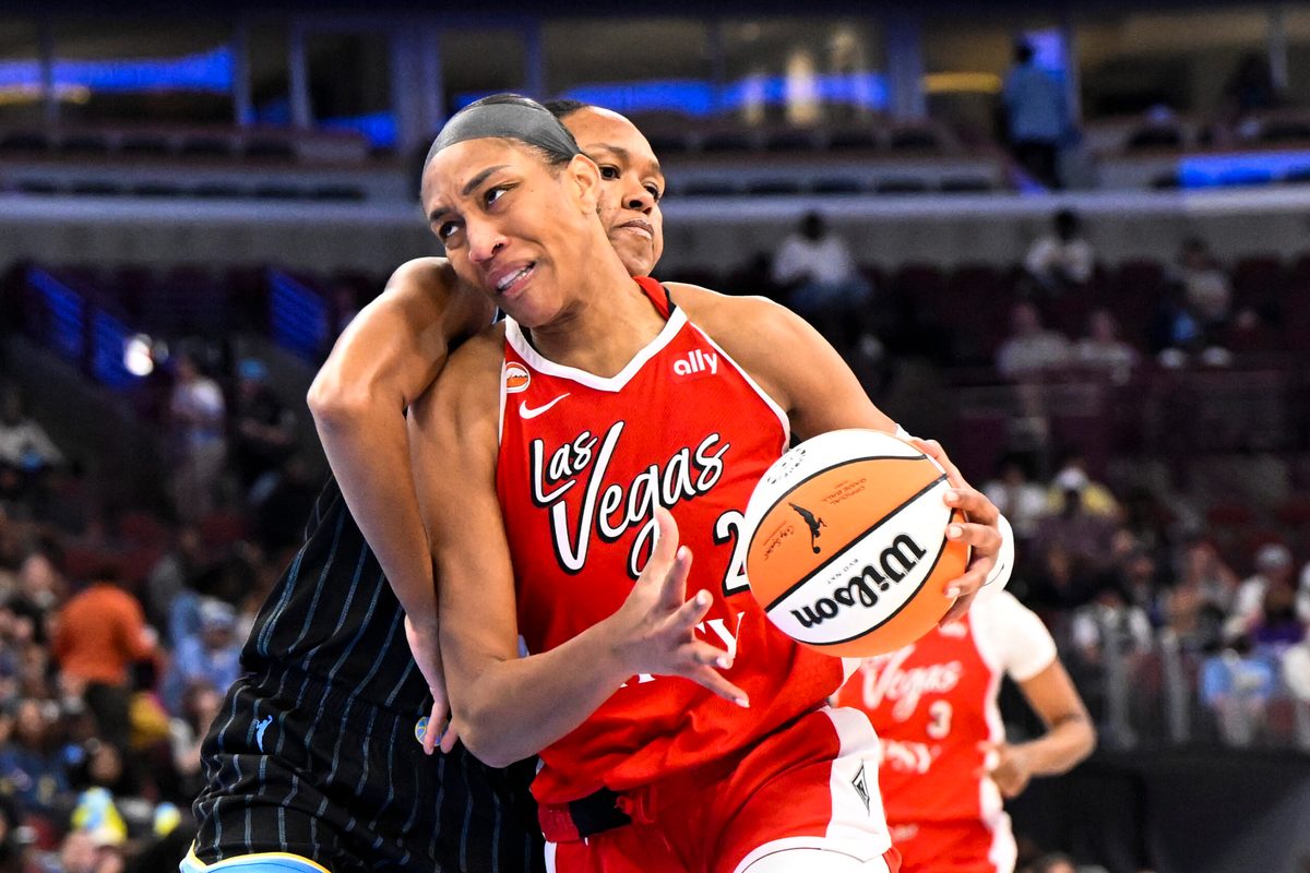 Jun 28, 2026; Chicago, Illinois, USA;  Las Vegas Aces center A'ja Wilson (22) drives to the basket against Chicago Sky forward-center  Azura Stevens (30) during the second half at United Center. Mandatory Credit: Matt Marton-Imagn Images