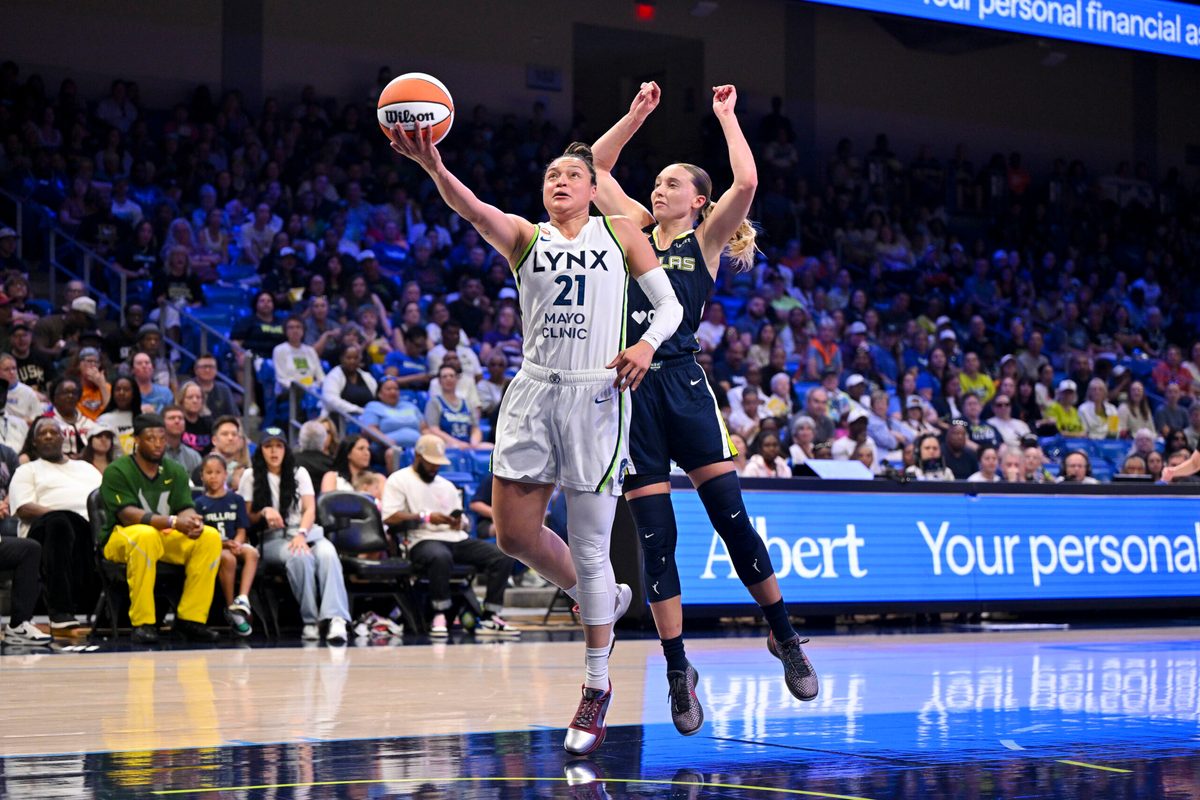 Jun 28, 2026; Arlington, Texas, USA; Minnesota Lynx guard Kayla McBride (21) and Dallas Wings guard Paige Bueckers (5) in action during the game between the Wings and the Lynx at College Park Center. Mandatory Credit: Jerome Miron-Imagn Images