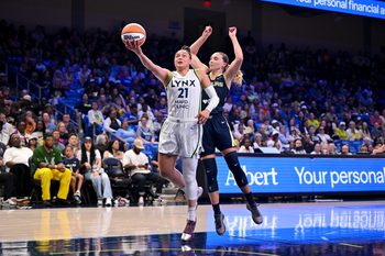 Jun 28, 2026; Arlington, Texas, USA; Minnesota Lynx guard Kayla McBride (21) and Dallas Wings guard Paige Bueckers (5) in action during the game between the Wings and the Lynx at College Park Center. Mandatory Credit: Jerome Miron-Imagn Images