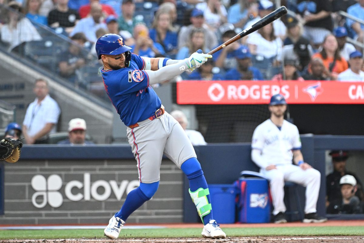 Jun 30, 2026; Toronto, Ontario, CAN;  New York Mets third baseman Bo Bichette (19) hits a single against the Toronto Blue Jays in the third inning at Rogers Centre. Mandatory Credit: Dan Hamilton-Imagn Images