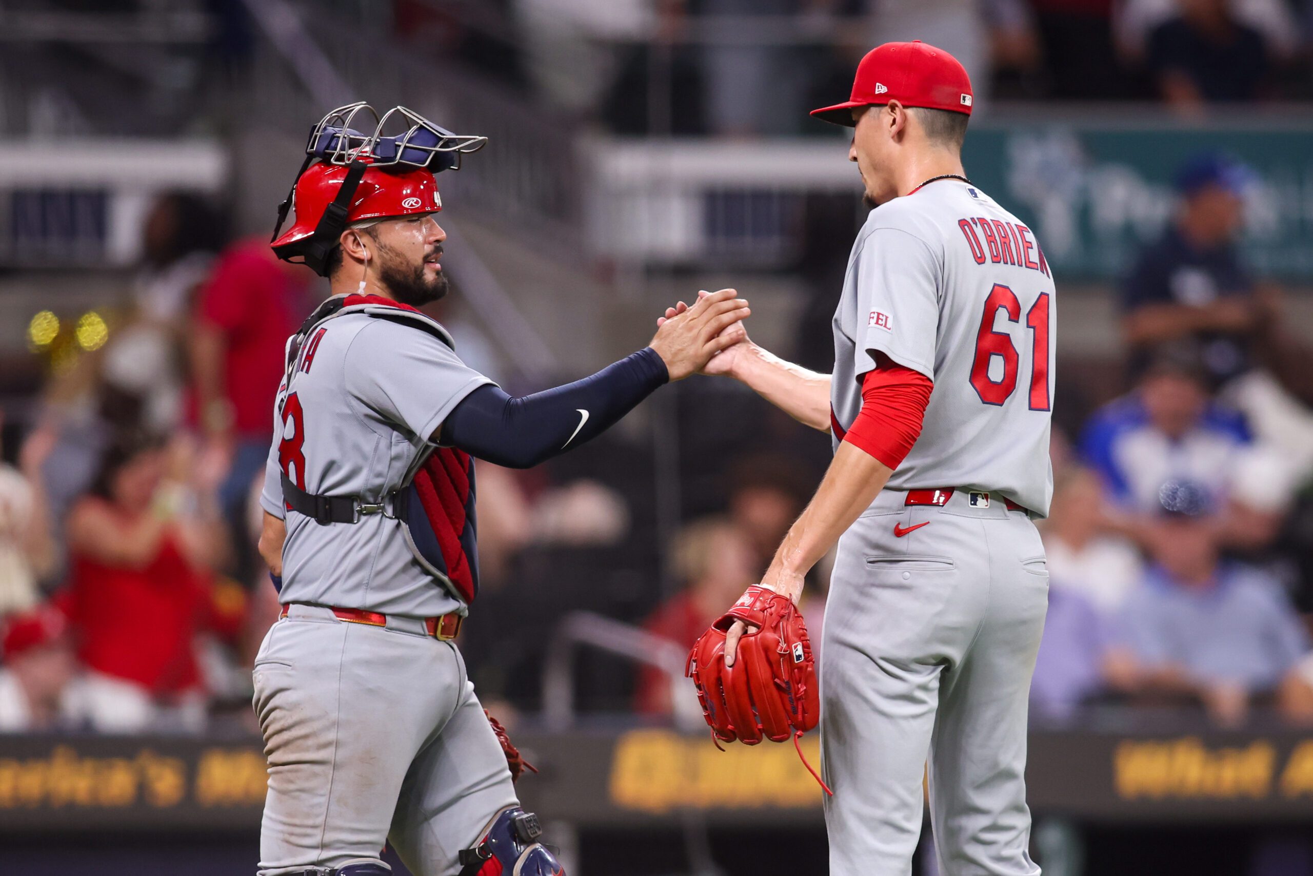 Jun 30, 2026; Atlanta, Georgia, USA; St. Louis Cardinals catcher Ivan Herrera (48) and pitcher Riley O'Brien (61) celebrate after a victory over the Atlanta Braves at Truist Park. Mandatory Credit: Brett Davis-Imagn Images