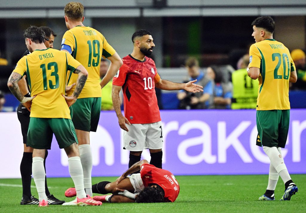 July 3, 2026; Arlington, Texas, U.S.; Egypt's Mohamed Salah and Australia's Cristian Volpato react as Egypt's Mohamed Hany is down after sustaining an injury. Mandatory Credit: Jerome Miron-Imagn Images