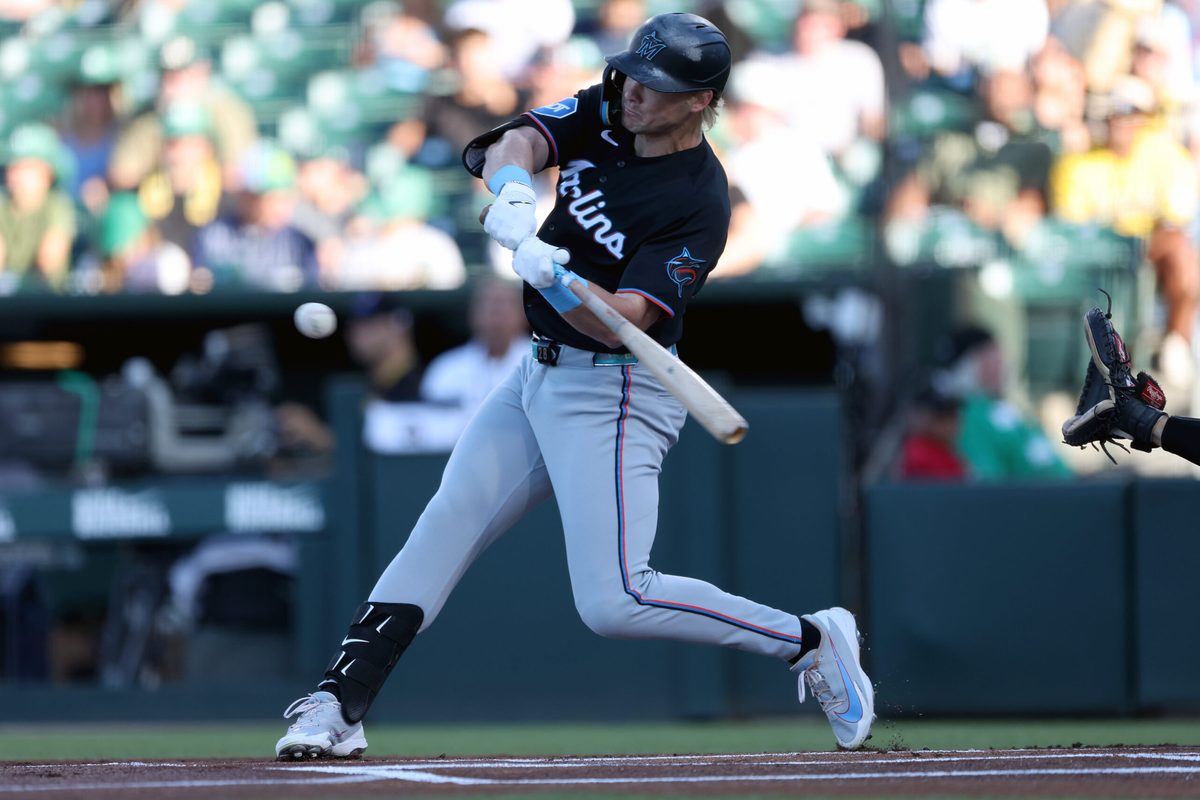 Jul 3, 2026; West Sacramento, California, USA; Miami Marlins first baseman Kyle Stowers (28) hits a single against the Athletics during the first inning at Sutter Health Park. Mandatory Credit: Dennis Lee-Imagn Images