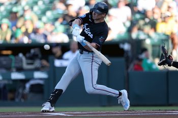 Jul 3, 2026; West Sacramento, California, USA; Miami Marlins first baseman Kyle Stowers (28) hits a single against the Athletics during the first inning at Sutter Health Park. Mandatory Credit: Dennis Lee-Imagn Images