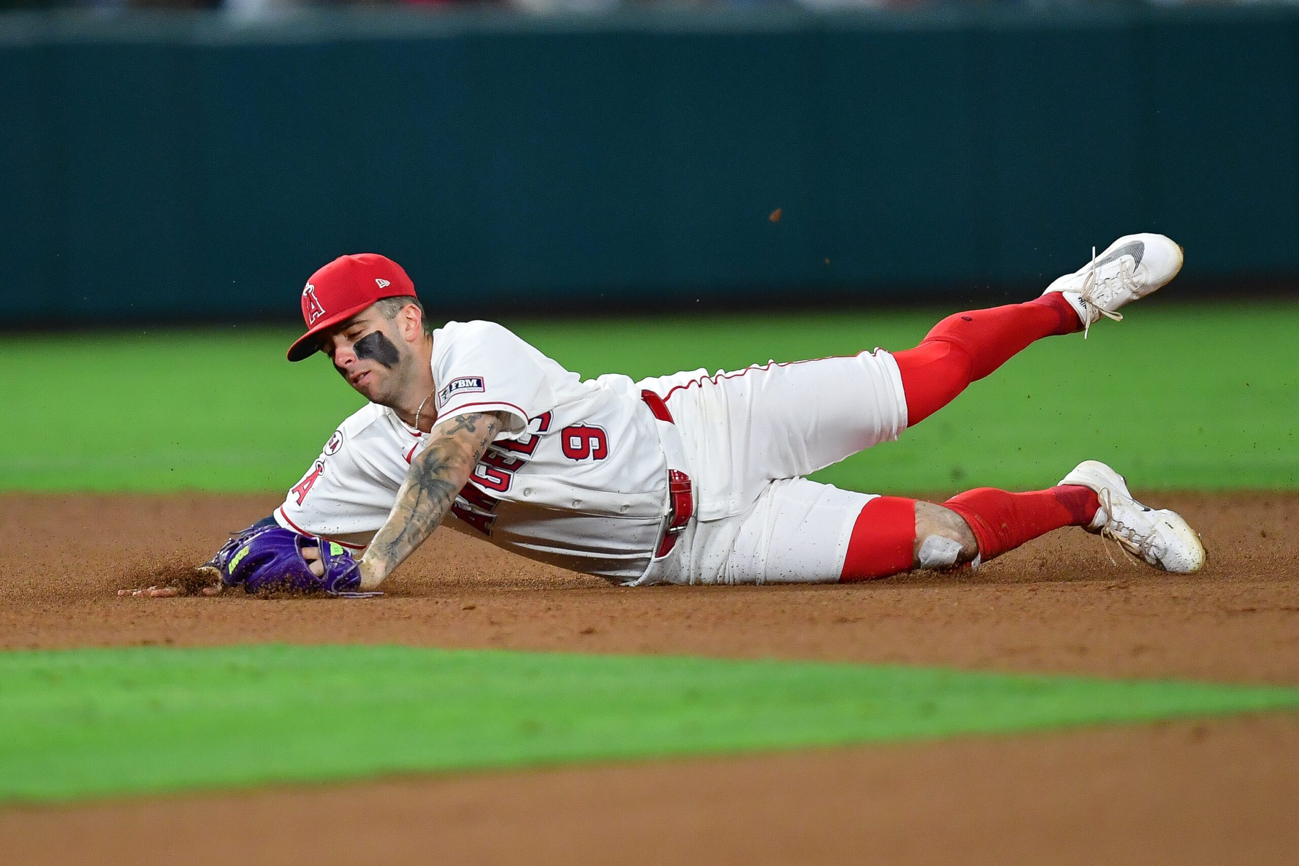 Jul 3, 2026; Anaheim, California, USA; Los Angeles Angels shortstop Zach Neto (9) catches the line drive of Boston Red Sox right fielder Nate Eaton (18) which results in a doulbe play during the eighth inning at Angel Stadium. Mandatory Credit: Gary A. Vasquez-Imagn Images