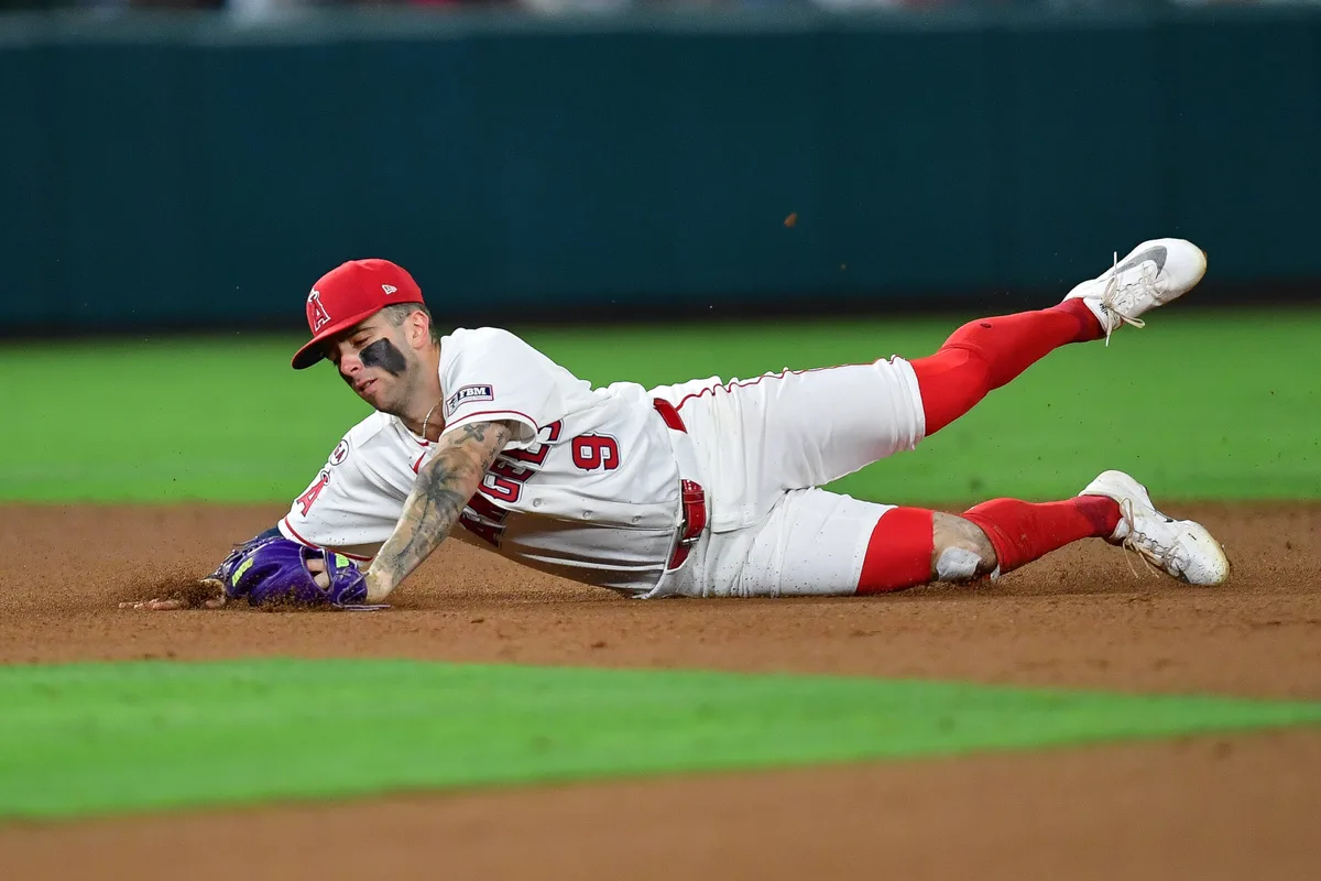 Jul 3, 2026; Anaheim, California, USA; Los Angeles Angels shortstop Zach Neto (9) catches the line drive of Boston Red Sox right fielder Nate Eaton (18) which results in a doulbe play during the eighth inning at Angel Stadium. Mandatory Credit: Gary A. Vasquez-Imagn Images