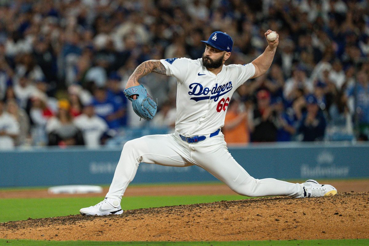 Jul 3, 2026; Los Angeles, California, USA; Los Angeles Dodgers pitcher Tanner Scott (66) earns a save in the top of the ninth inning against the San Diego Padres at Dodger Stadium. Mandatory Credit: Jon Endow-Imagn Images
