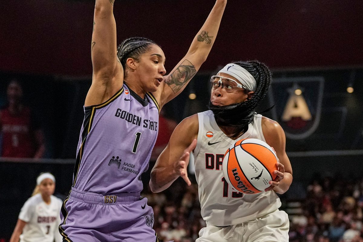 Jul 4, 2026; College Park, Georgia, USA; Atlanta Dream guard Allisha Gray (15) controls the ball against Golden State Valkyries forward Gabby Williams (1) during the first half at Gateway Center Arena at College Park. Mandatory Credit: Dale Zanine-Imagn Images