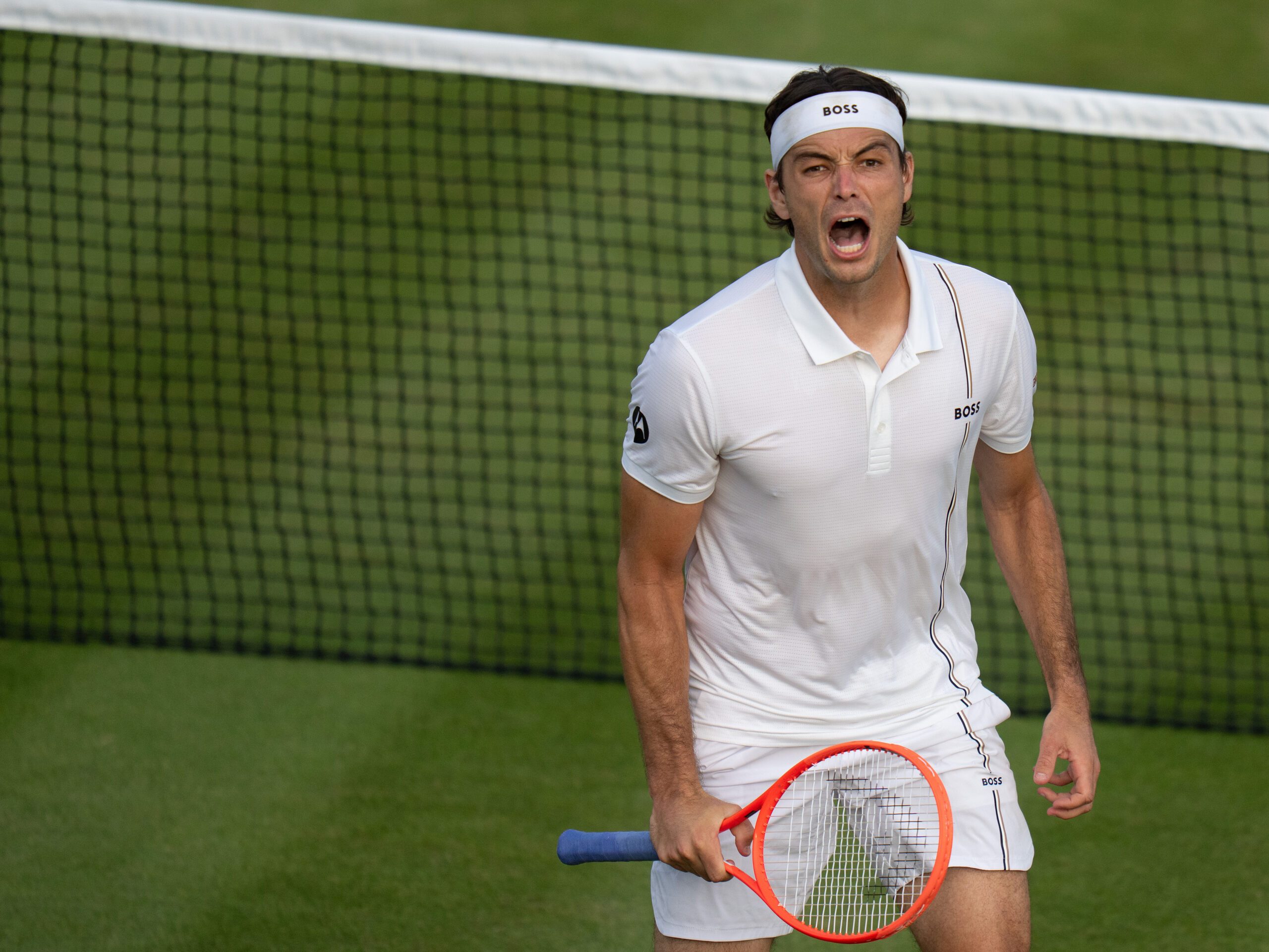 Jul 4, 2026; London, United Kingdom; Taylor Fritz of the United States celebrates winning his match against Lorenzo Sonego of Italy on day six at All England Lawn Tennis and Croquet Club.  Mandatory Credit: Susan Mullane-Imagn Images
