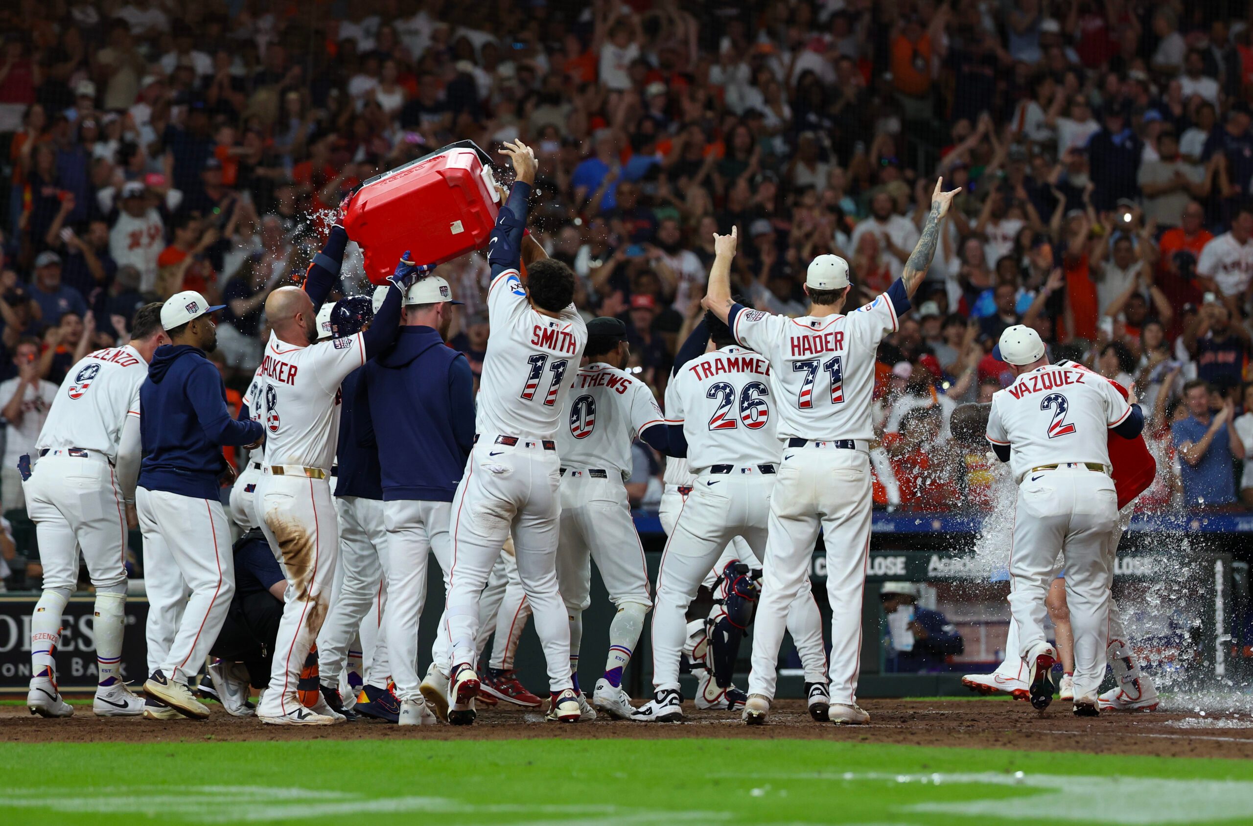 Jul 4, 2026; Houston, Texas, USA;  Houston Astros players celebrate after designated hitter Yordan Alvarez (44) hit a two-run game-winning home run against the Tampa Bay Rays in the ninth inning at Daikin Park. Mandatory Credit: Thomas Shea-Imagn Images