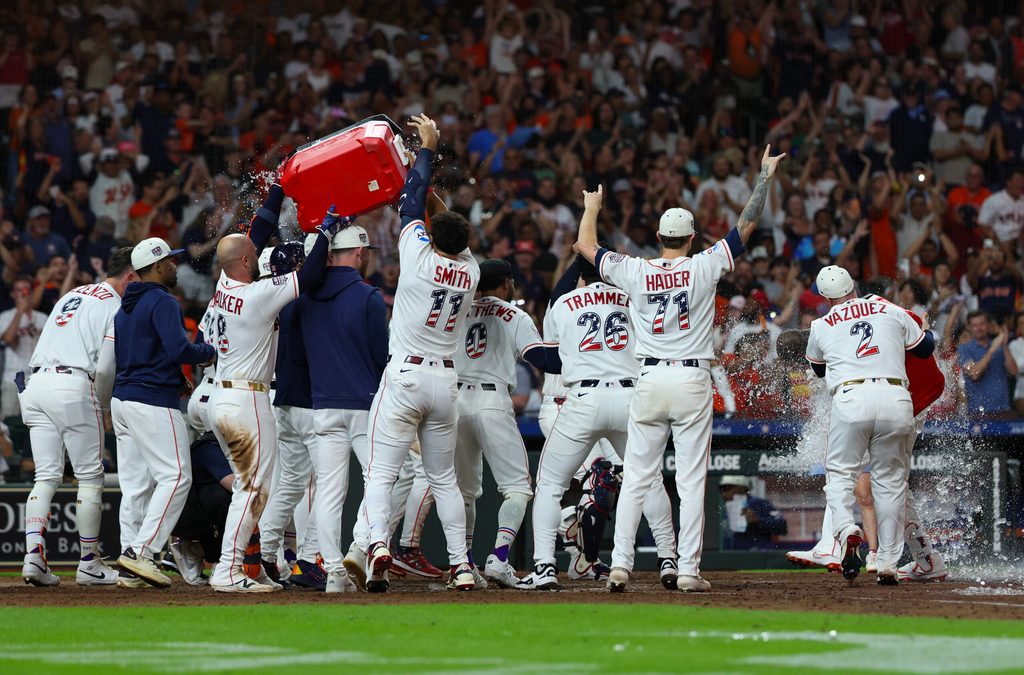 Jul 4, 2026; Houston, Texas, USA; Houston Astros players celebrate after designated hitter Yordan Alvarez (44) hit a two-run game-winning home run against the Tampa Bay Rays in the ninth inning at Daikin Park. Mandatory Credit: Thomas Shea-Imagn Images