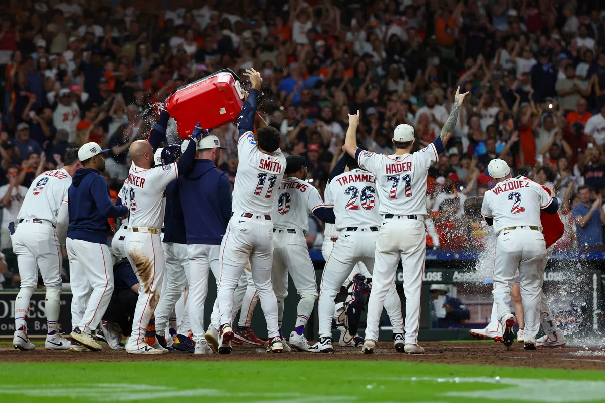 Jul 4, 2026; Houston, Texas, USA; Houston Astros players celebrate after designated hitter Yordan Alvarez (44) hit a two-run game-winning home run against the Tampa Bay Rays in the ninth inning at Daikin Park. Mandatory Credit: Thomas Shea-Imagn Images