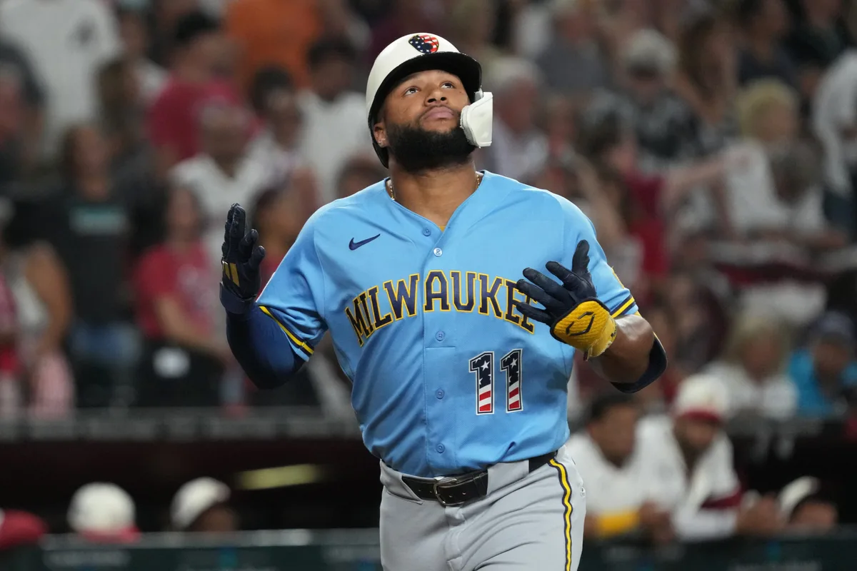 Jul 4, 2026; Phoenix, Arizona, USA; Milwaukee Brewers left fielder Jackson Chourio (11) hits a home run against the Arizona Diamondbacks in the ninth inning at Chase Field. Mandatory Credit: Rick Scuteri-Imagn Images