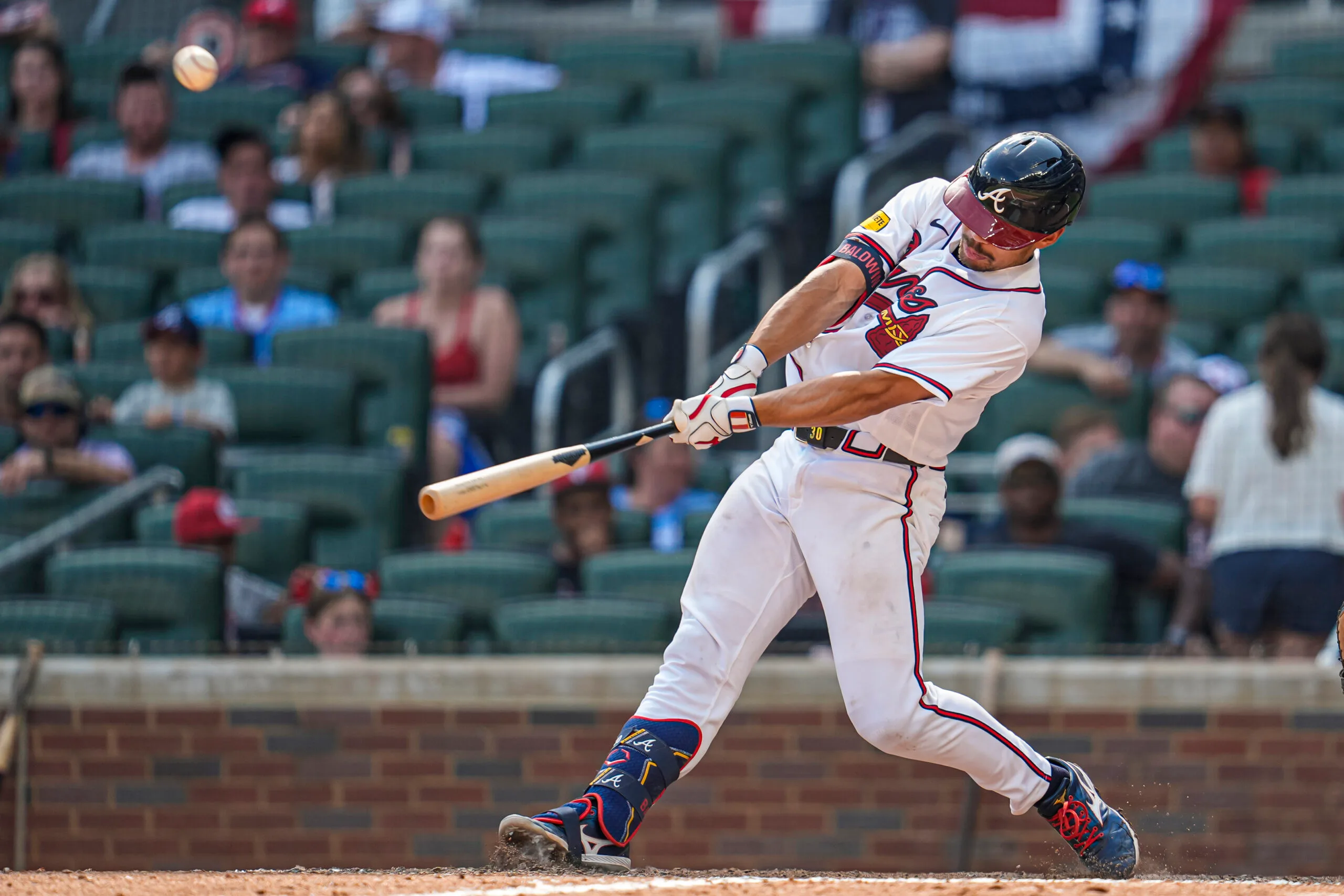Jul 5, 2026; Cumberland, Georgia, USA; Atlanta Braves catcher Drake Baldwin (30) hits a grand slam home run against the New York Mets during the ninth inning at Truist Park. Mandatory Credit: Dale Zanine-Imagn Images