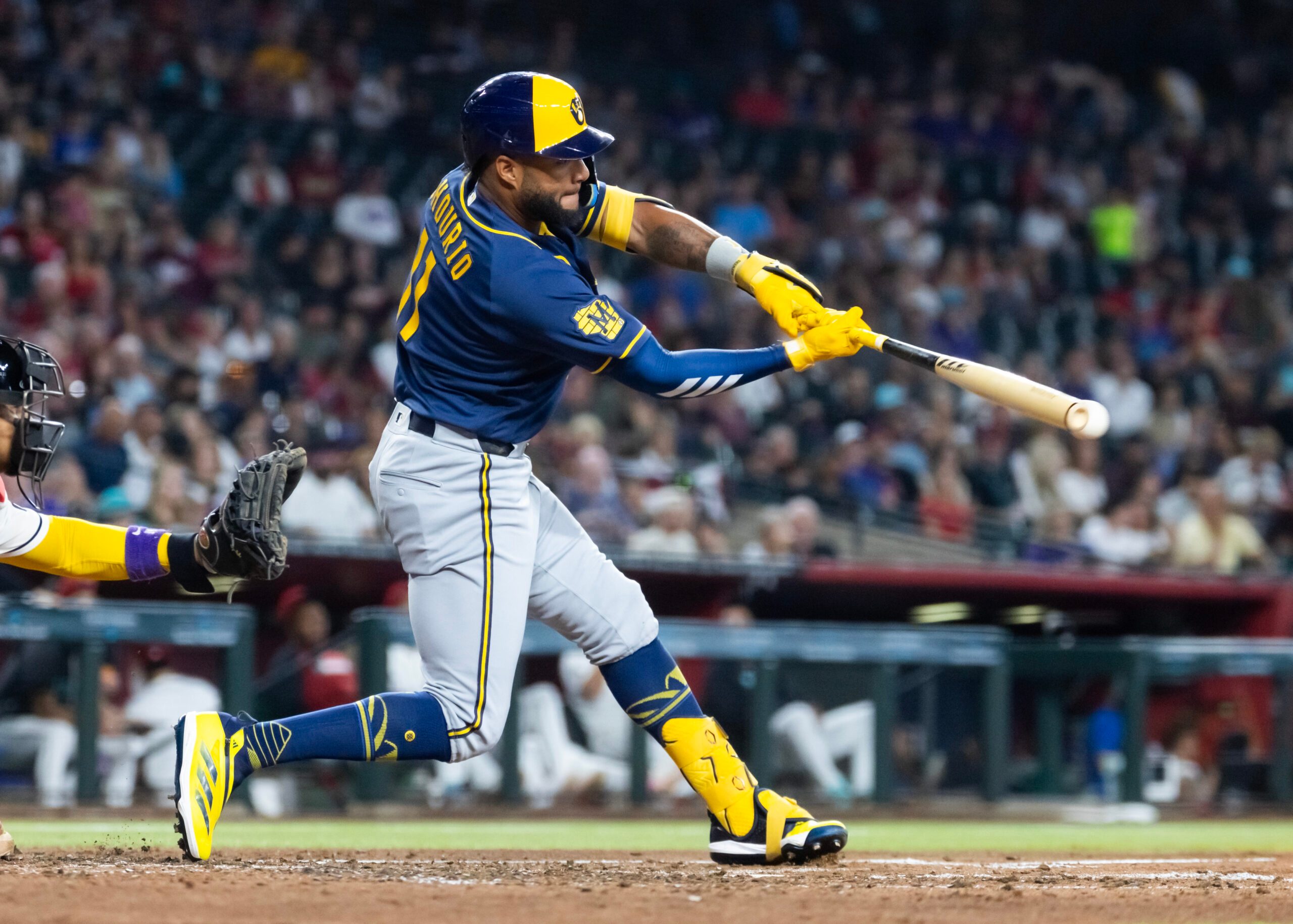 Jul 5, 2026; Phoenix, Arizona, USA; Milwaukee Brewers outfielder Jackson Chourio hits a fourth inning single against the Arizona Diamondbacks at Chase Field. Mandatory Credit: Mark J. Rebilas-Imagn Images