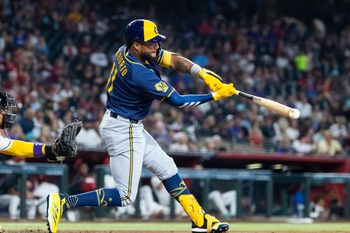 Jul 5, 2026; Phoenix, Arizona, USA; Milwaukee Brewers outfielder Jackson Chourio hits a fourth inning single against the Arizona Diamondbacks at Chase Field. Mandatory Credit: Mark J. Rebilas-Imagn Images