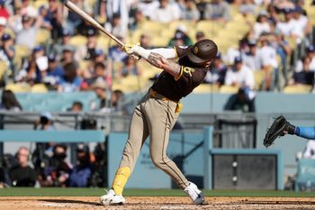 Jul 5, 2026; Los Angeles, California, USA; San Diego Padres center fielder Jackson Merrill (3) hits a RBI single in the fourth inning against the Los Angeles Dodgers at Dodger Stadium. Mandatory Credit: Kiyoshi Mio-Imagn Images