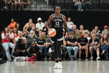 Jul 5, 2026; Las Vegas, Nevada, USA; Las Vegas Aces guard Chelsea Gray (12) dribbles against against the Indiana Fever in the first quarter of their game at T-Mobile Arena. Mandatory Credit: Candice Ward-Imagn Images