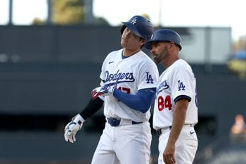 Jul 5, 2026; Los Angeles, California, USA; Los Angeles Dodgers designated hitter Shohei Ohtani (17) reacts at first base after hitting a 2-RBI single in the seventh inning against the San Diego Padres at Dodger Stadium. Mandatory Credit: Kiyoshi Mio-Imagn Images