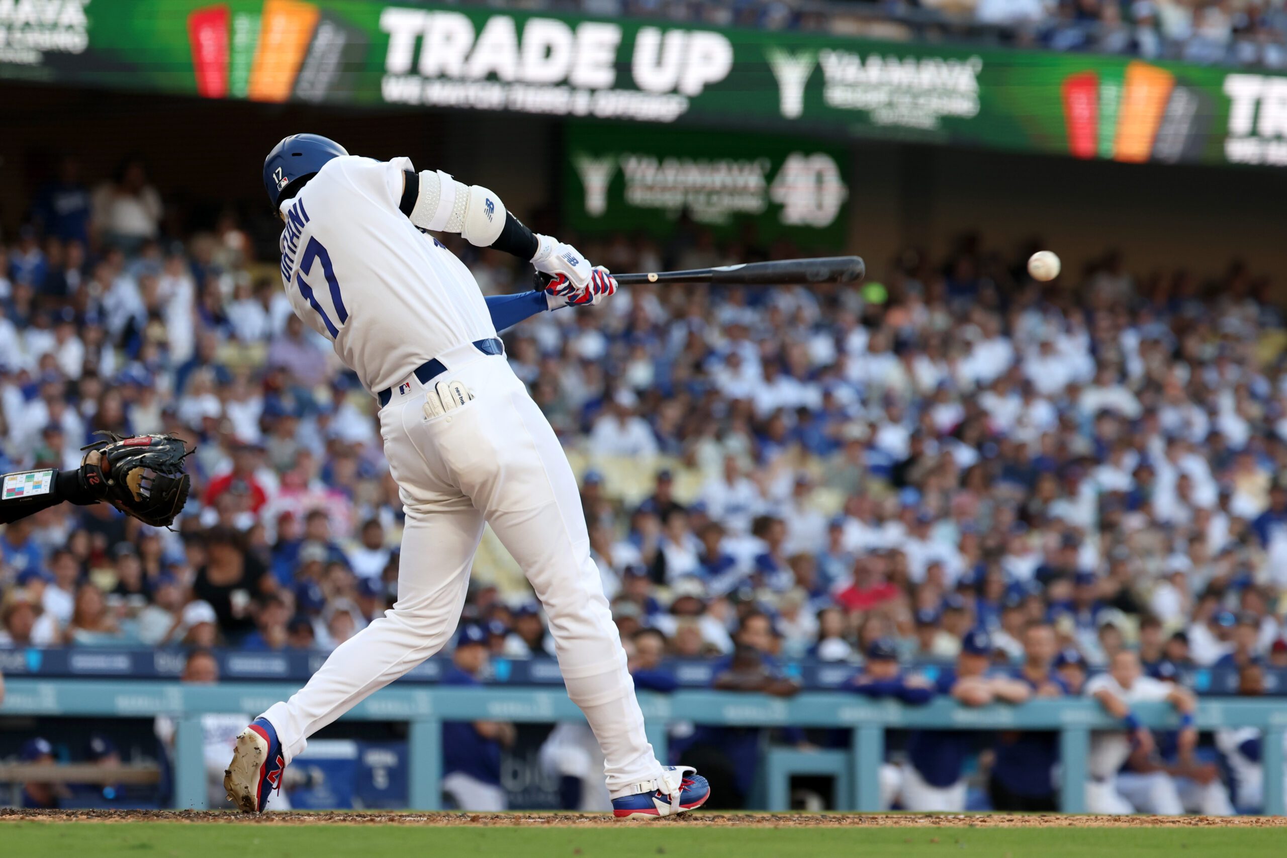 Jul 5, 2026; Los Angeles, California, USA; Los Angeles Dodgers designated hitter Shohei Ohtani (17) hits a 2-RBI single in the seventh inning against the San Diego Padres at Dodger Stadium. Mandatory Credit: Kiyoshi Mio-Imagn Images