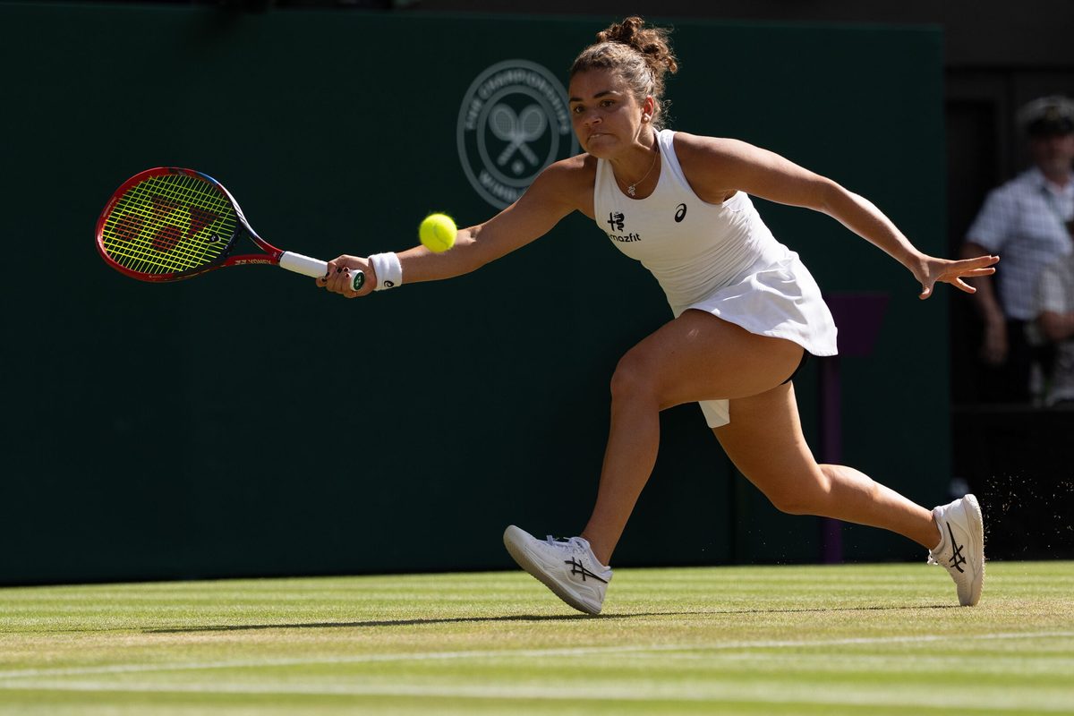 Jul 6 2026; London, United Kingdom; Jasmine Paolini of Italy returns a shot during her match against Alexandra Eala of the Philippines on day eight at All England Lawn Tennis and Croquet Club. Mandatory Credit: Susan Mullane-Imagn Images