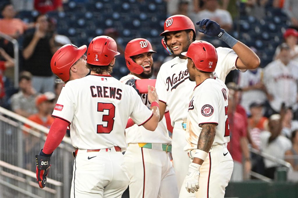 Jul 6, 2026; Washington, District of Columbia, USA; Washington Nationals designated hitter James Wood (29) is congratulated by teammates after hitting a grand slam during the fifth inning against the Houston Astros at Nationals Park. Mandatory Credit: Brad Mills-Imagn Images