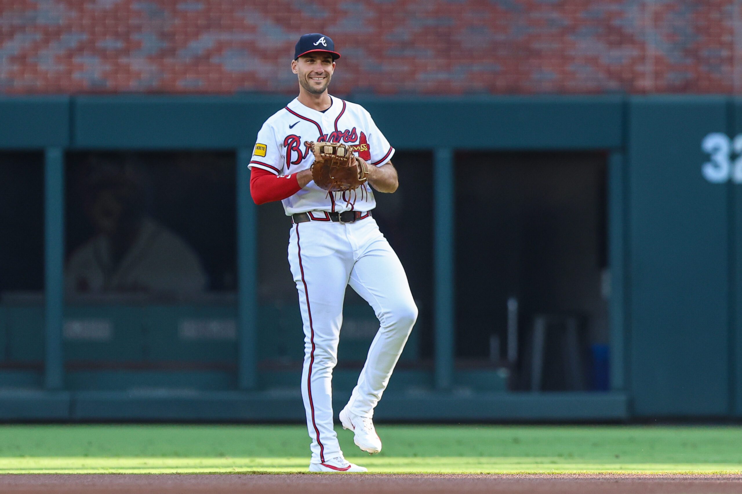 Jul 6, 2026; Cumberland, Georgia, USA; Atlanta Braves first baseman Matt Olson (28) smiles while warming up before the game against the New York Mets at Truist Park. Mandatory Credit: Jordan Godfree-Imagn Images