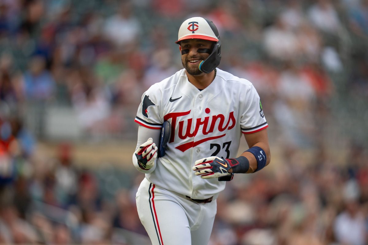 Jul 7, 2026; Minneapolis, Minnesota, USA; Minnesota Twins first baseman Royce Lewis (23) reacts to drawing a walk against the Cleveland Guardians in the first inning at Target Field. Mandatory Credit: Jesse Johnson-Imagn Images