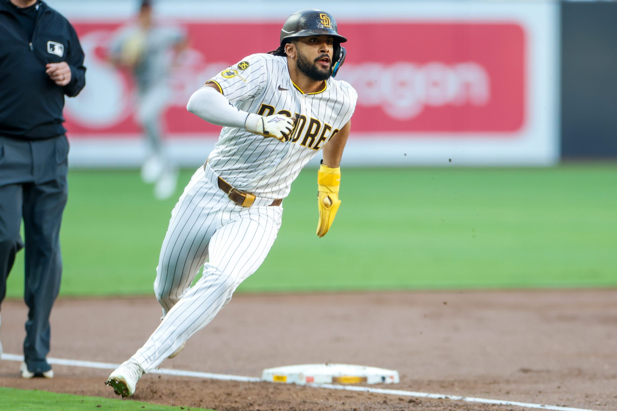 Jul 7, 2026; San Diego, California, USA; San Diego Padres right fielder Fernando Tatis Jr. (23) rounds thrid base during the first inning against the Arizona Diamondbacks at Petco Park. Mandatory Credit: David Frerker-Imagn Images