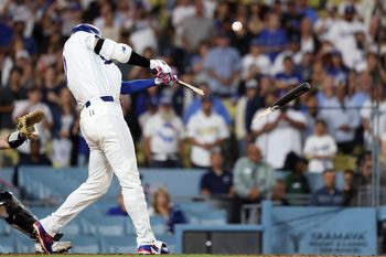 Jul 7, 2026; Los Angeles, California, USA;  Los Angeles Dodgers designated hitter Shohei Ohtani (17) brakes his bat during the ninth inning against the Colorado Rockies at Dodger Stadium. Mandatory Credit: Kiyoshi Mio-Imagn Images