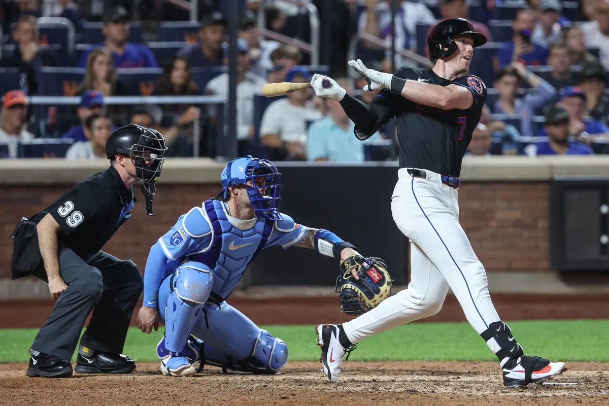 Jul 8, 2026; New York City, New York, USA; New York Mets second baseman Brett Baty (7) hits a two run single in the eighth inning against the Kansas City Royals at Citi Field. Mandatory Credit: Wendell Cruz-Imagn Images