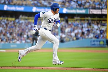 Jul 8, 2026; Los Angeles, California, USA; Los Angeles Dodgers first baseman Freddie Freeman (5) runs to first base after hitting a double in the first inning against the Colorado Rockies at Dodger Stadium. Mandatory Credit: Gary A. Vasquez-Imagn Images