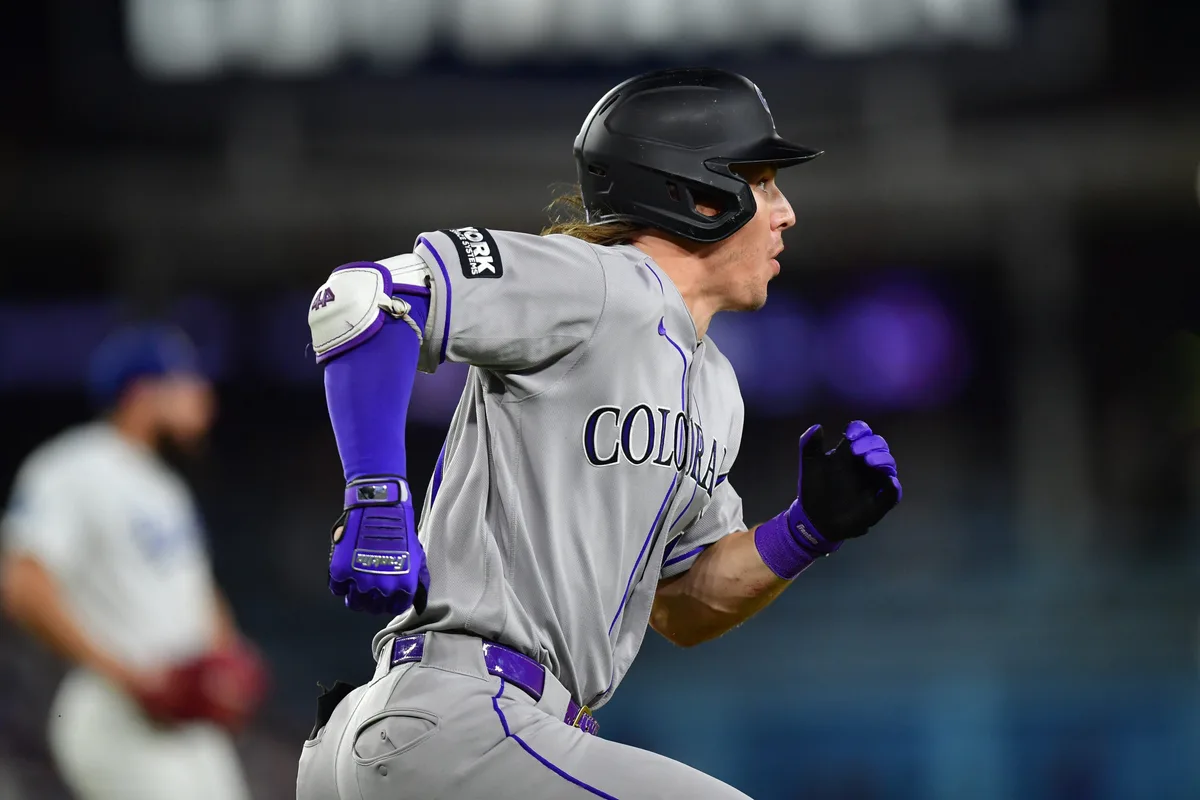 Jul 8, 2026; Los Angeles, California, USA; Colorado Rockies center fielder Jake McCarthy (31) runs after hitting a double against the Los Angeles Dodgers during the eighth inning at Dodger Stadium. Mandatory Credit: Gary A. Vasquez-Imagn Images
