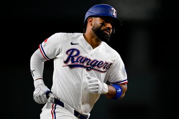 Jul 9, 2026; Arlington, Texas, USA; Texas Rangers shortstop Ezequiel Duran (20) rounds the bases after he hits a two run home run against the Los Angeles Angels during the third inning at Globe Life Field. Mandatory Credit: Jerome Miron-Imagn Images