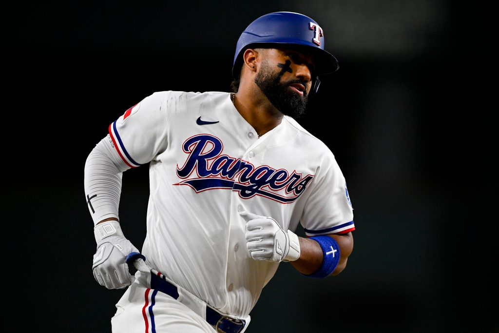Jul 9, 2026; Arlington, Texas, USA; Texas Rangers shortstop Ezequiel Duran (20) rounds the bases after he hits a two run home run against the Los Angeles Angels during the third inning at Globe Life Field. Mandatory Credit: Jerome Miron-Imagn Images