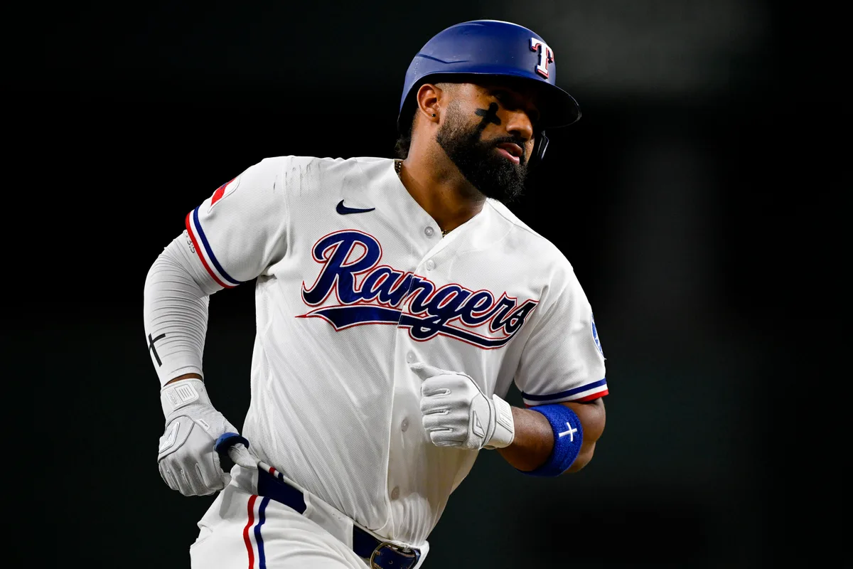 Jul 9, 2026; Arlington, Texas, USA; Texas Rangers shortstop Ezequiel Duran (20) rounds the bases after he hits a two run home run against the Los Angeles Angels during the third inning at Globe Life Field. Mandatory Credit: Jerome Miron-Imagn Images